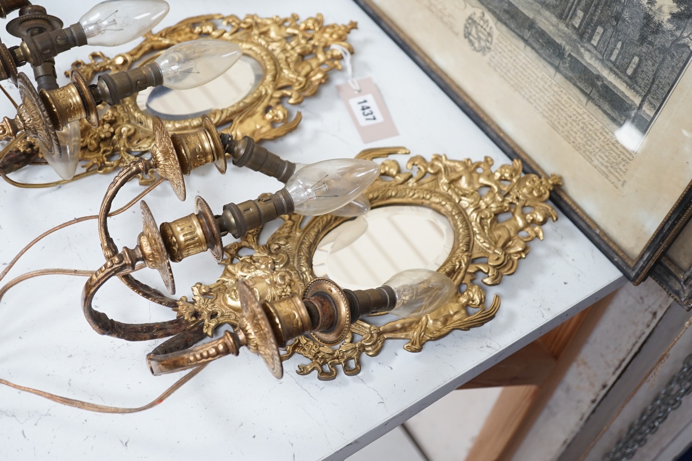 A pair of ormolu three branch girandole mirrors, c.1900, Converted to electricity, 40 cm high